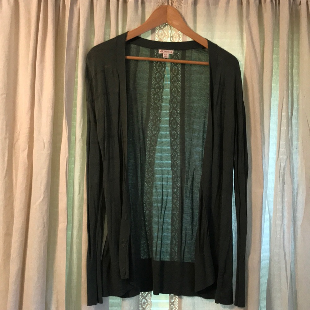 Green cardigan.
